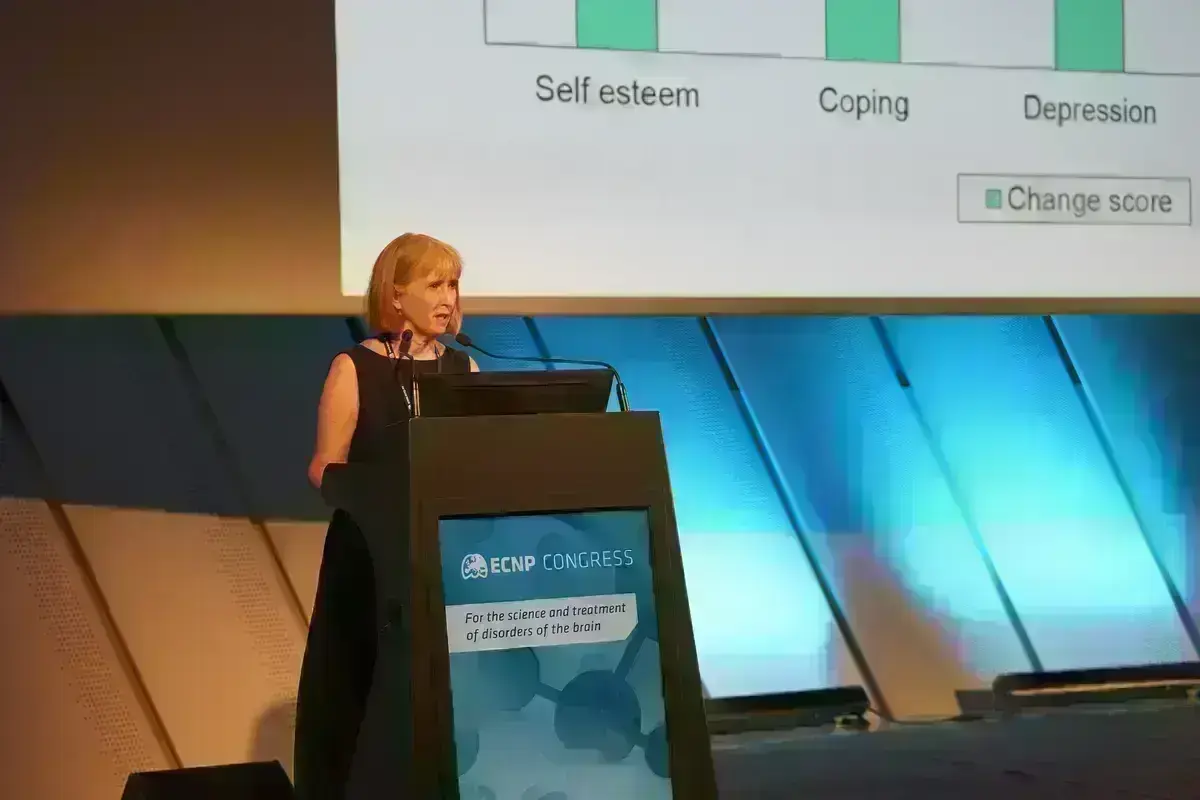 Professor Dame Til Wykes presenting