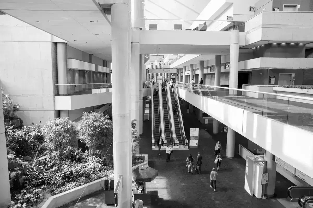 HCPs heading to a lecture about achieving good outcomes with patients.